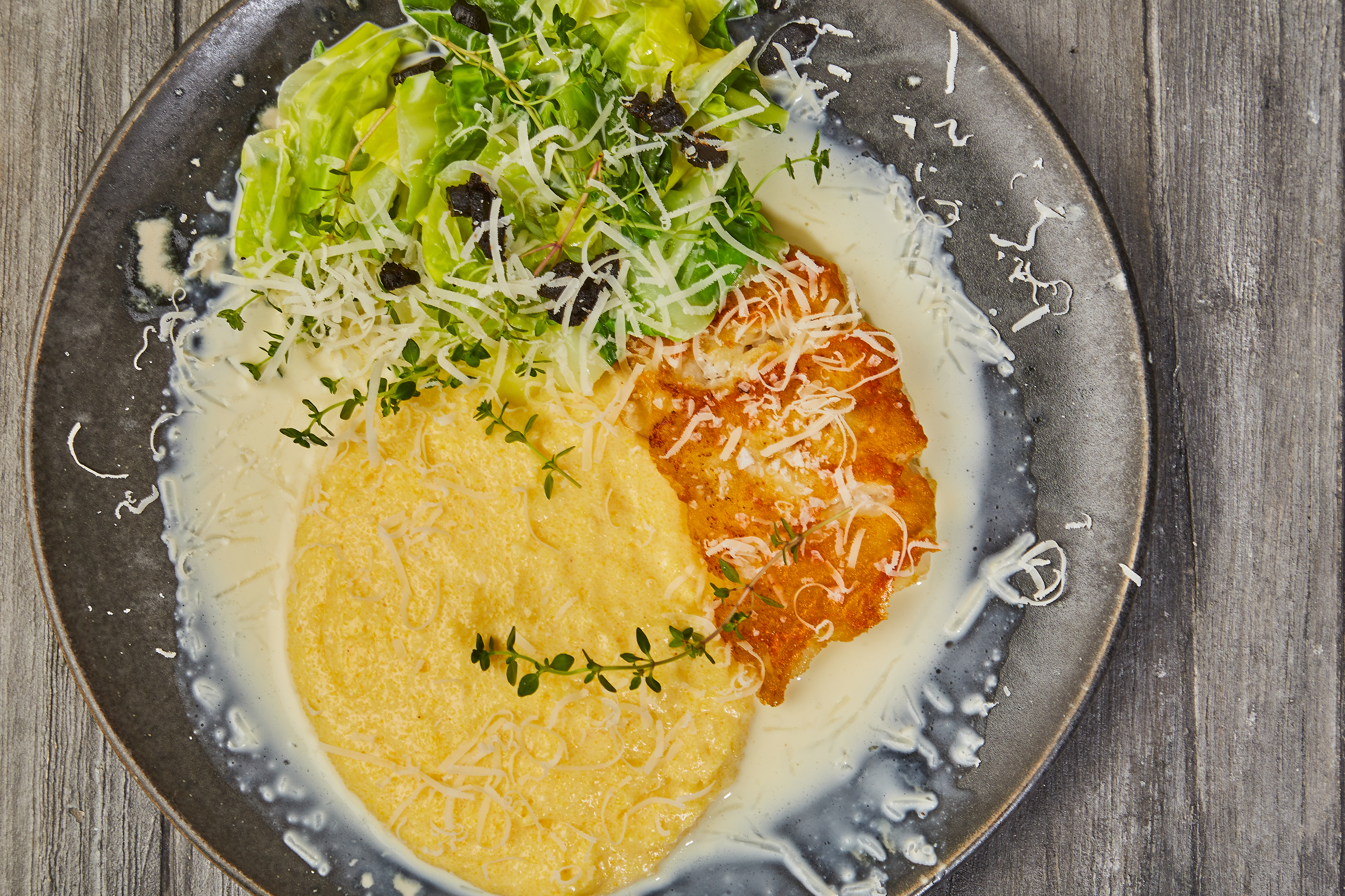 Stegt kullerfilet med stuvet spidskål og cremet polenta